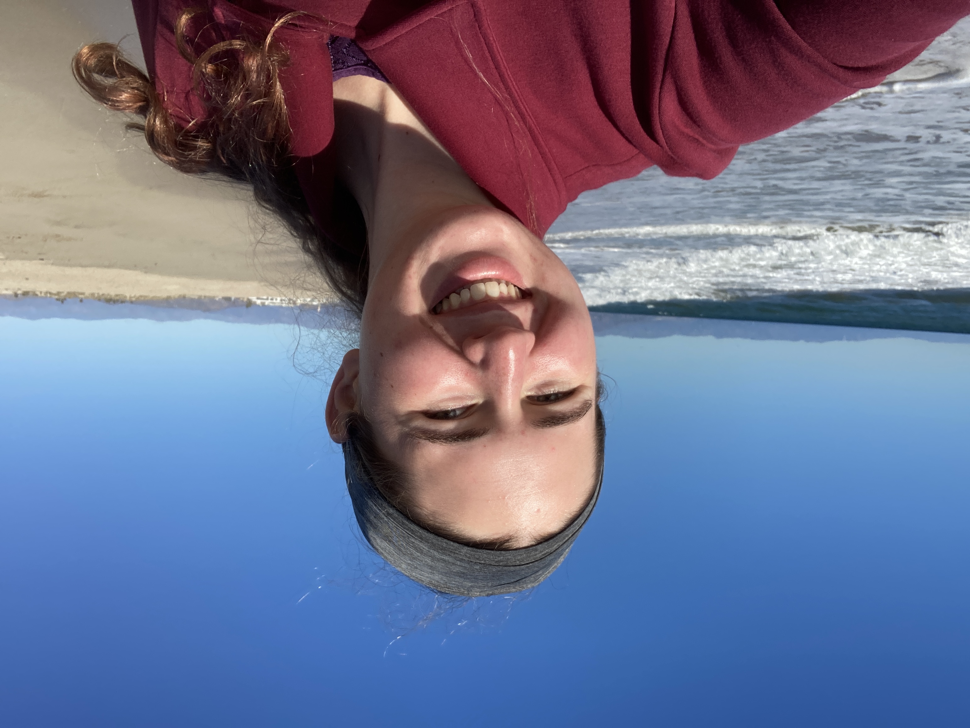 Me smiling at the beach